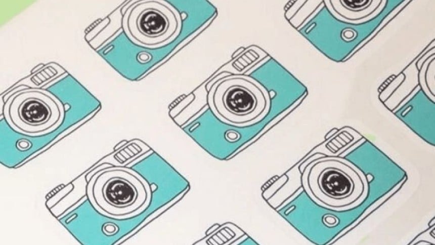 oglio di etichette adesive con stampata una fotocamera vintage