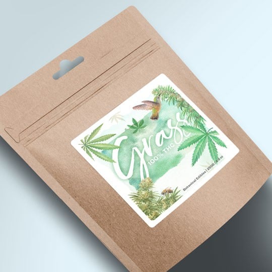 confezione in cartoncino con etichetta adesiva stampata con motivo tropicale
