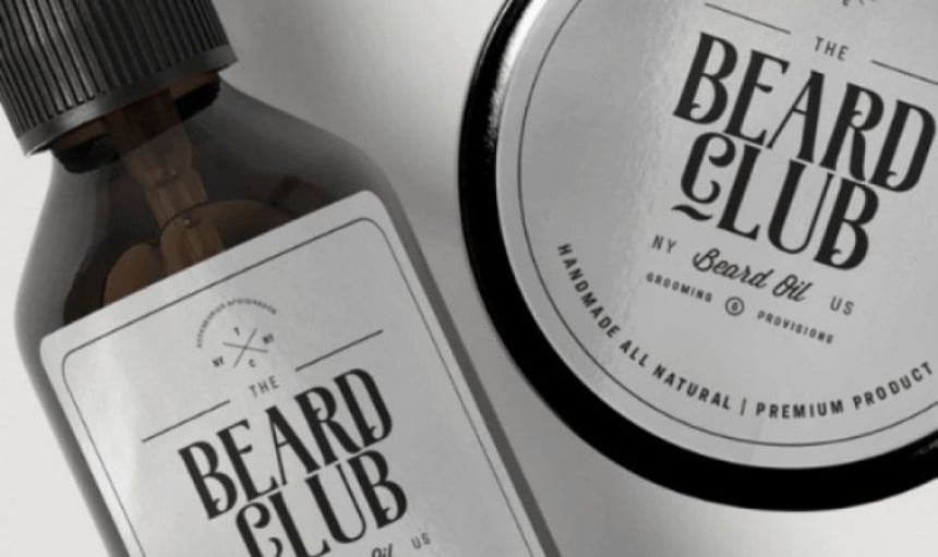 Bottiglia di olio per barba e barattolo di balsamo per barba con applicate etichette adesive argento