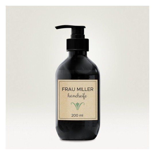 Un flacone di sapone liquido per le mani di colore nero con un'etichetta che mostra 'FRAU MILLER handseife' e un volume di 200 ml.