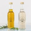 due bottiglie di olio con etichetta trasparente stampata