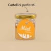 cartellino rotondo stampato e applicato al barattolo di miele con un cordoncino
