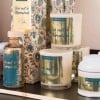 diverse candele con etichette stampate oro