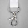 Lanyard clip made of metal, attached to a white strap.