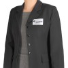 In the image, a person is wearing a black blazer and a grey shirt underneath. There is a name tag on the blazer that reads 'Julia SMITH' with the designation 'Marketing' beneath it.