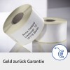 Labeled rolls with an address for Anna Holland in Berlin and a guarantee message.