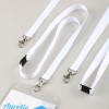 Lanyards in various lengths made of white material with metal clips for attaching items, positioned next to a clear badge holder.