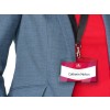 The image shows a person wearing a blue blazer and a red shirt, with a name badge attached to the blazer. The badge displays the name 'Catherin Molton.'
